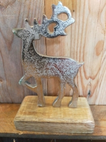 Metal Reindeer on wooden stand